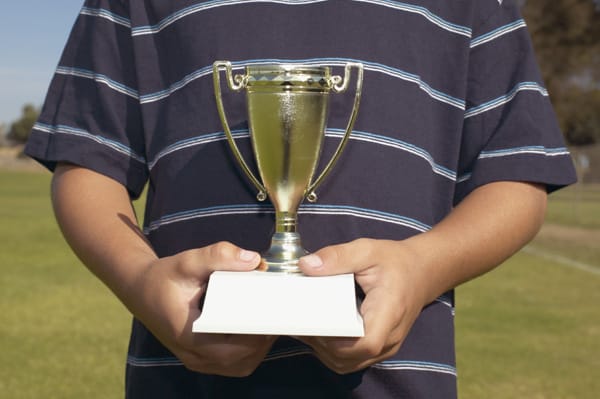 Should Trophies be "Earned" or Given?